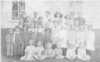 students and their teachers outside of a school