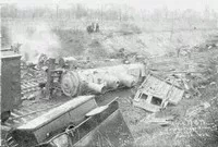train parts scattered at a crash site