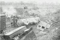 train parts scattered at a crash site