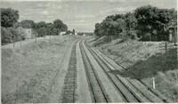 black and white photo of railroad tracks