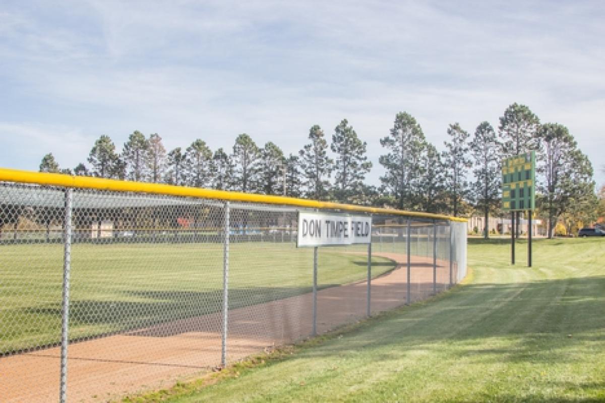 baseball diamond with a fence around it